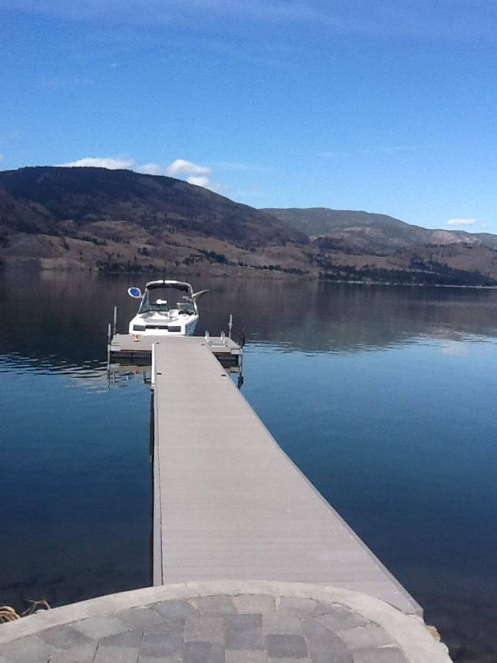 residential dock on lake at dusk